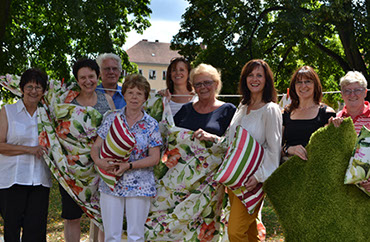 Textilpflege Albert Bamberg | Das Team des Bamberger Traditionsunternehmens im Bereich Textilpflege
